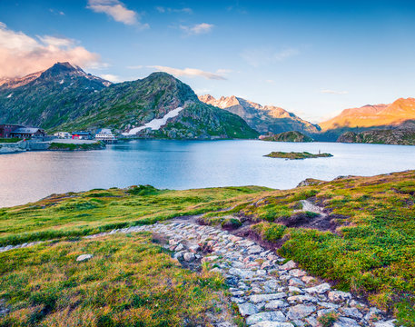 Great summer view of Totensee lake on the top of Grimselpass. Picturesque outdoor scene of Swiss Alps, Bern canton, Switzerland, Europe. Beauty of countryside concept background.