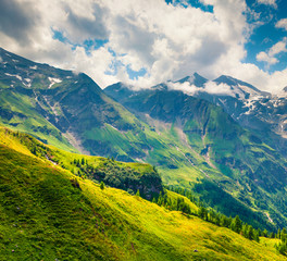 Misty morning view of Grossglockner mountain range from Grossglockner High Alpine Road. Sunny outdoor scene in Austrian Alps, Zell am See district, state of Salzburg in Austria, Europe.