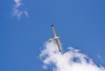 Glider plane riding the thermals high above Latriff Fell, Keswick, Cumbria, UK