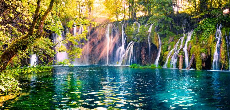 Last Sunlight Lights Up The Pure Water Waterfall On Plitvice National Park. Colorful Spring Panorama Of Green Forest With Blue Lake. Great Countryside View Of Croatia, Europe. 