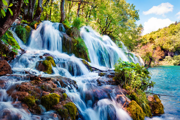 Fototapeta na wymiar Bright morning in Plitvice National Park. Colorful spring scene of green forest with pure water waterfall. Great countryside view of Croatia, Europe. Traveling concept background.