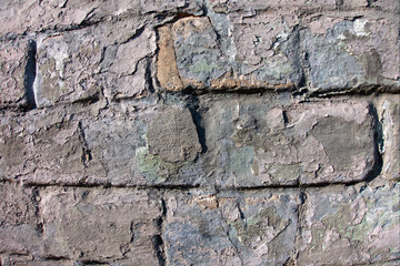 Stone and brick wall background with concrete elements