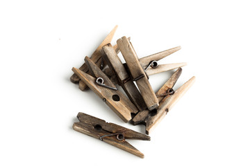 Wooden clothespins isolated on white background