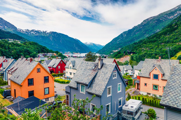 Fototapeta na wymiar Typical Norwagian architecture in Odda town, Hordaland county, Norway. Beautiful summer view of Hardangerfjord fjord. Traveling concept background.