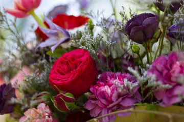 bouquet of different flowers and pink roses