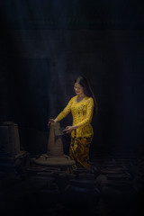 Asian beautiful woman are making pottery.