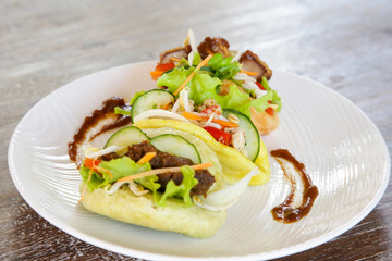 Spanish finger food. Tacos with meat and vegetables