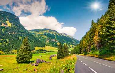 Beautiful summer view of famous Grossglockner High Alpine Road. Great morning scene of Austrian Alps, Upper Austria, Europe. Traveling concept background.