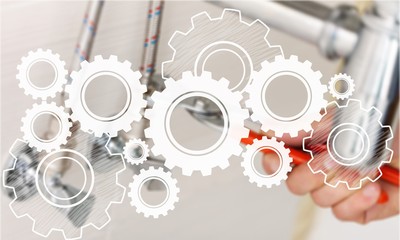Plumber hands fixing water tap on background