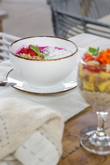 Delicious smoothie bowl and chia seed pudding served on the table, healthy organic breakfast option