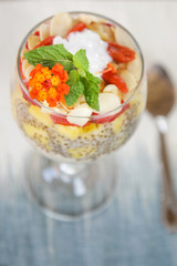 Chia pudding with strawberry, mango and sliced almonds, healthy delicious breakfast option