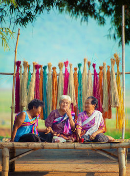 Asian old woman taking with happiness in countryside.