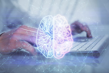 Man with computer background with brain theme hologram. Concept of brainstorm. Double exposure.