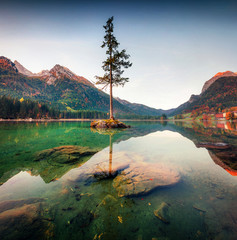 Dramatic autumn sunrise of Hintersee lake. Colorful morning view of Bavarian Alps on the Austrian border, Germany, Europe. Beauty of nature concept background.