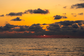 Colorful sunset above the sea. Summer vacation concept