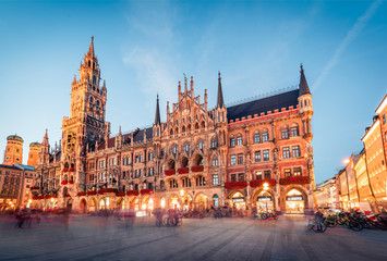 Great evening view of Marienplatz - City-center square & transport hub with towering St. Peter's church, two town halls and a toy museum, Munich, Bavaria, Germany, Europe. - obrazy, fototapety, plakaty