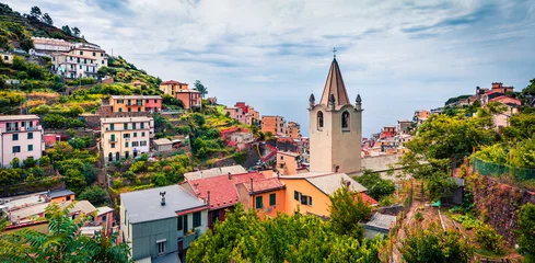 Fototapeten Ligurien First city of the Cique Terre sequence of hill cities - Riomaggiore. Picturesque spring scene in Liguria, Italy, Europe. Traveling concept background.  © Andrew Mayovskyy