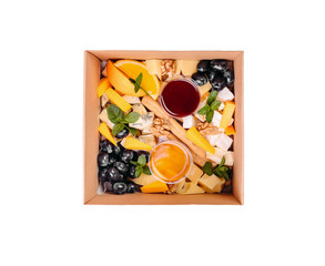 Collection of take away kraft boxes with  different food. Set of containers with everyday meals - meat, vegetables and law fat snacks on white background, top view. - Изображение