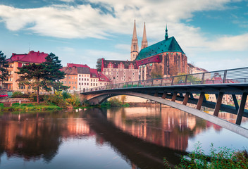 Fototapeta na wymiar Spectacular morning view of St Peter and Paul’s Church, on the Polish border. Colorful autumn cityscape of Gorlitz, eastern Germany, Europe. Traveling concept background.