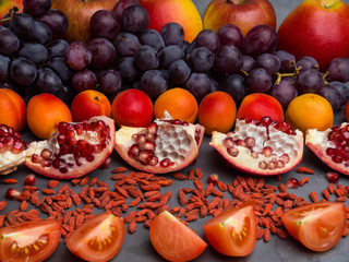 Obraz na płótnie Canvas red fruits and berrys rich vitamin, resveratrol, astaxanthin antioxidants food, close up