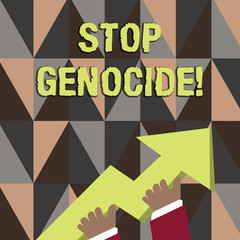 Word writing text Stop Genocide. Business photo showcasing to put an end on the killings and atrocities of showing photo of Hand Holding Colorful Huge 3D Arrow Pointing and Going Up