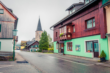 Misty autumn cityscape of Altaussee town, district of Liezen in Styria, Austria. Beauty of countryside concept background. Instagram filter toned.