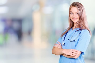 Young nurse woman with stethoscope at hospital