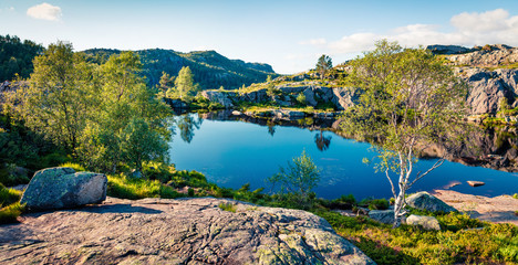 Wonderful summer view of small lake on the mountain plateau. Colorful morning scene on the Nowray...