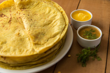 Holi festival, Traditional Maharashtrian food on the occasion of Holi. Puranpoli made of Jaggery. And cold drink made of curd.