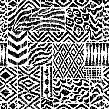 Seamless pattern in patchwork style. Zebra, leopard fur, ethnic and tribal motifs. Black and white patchwork print. Handwork. Grunge texture. Vector illustration.