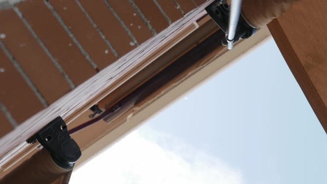 unfolding the awning