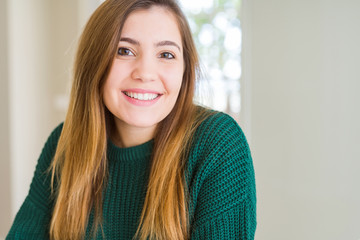 Beautiful young woman smiling confident to the camera