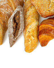 Composition with bread, rolls and wheat ears isolated on white background
