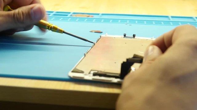 Repairing and Changing of a Screen on a iPhone Mobile Phone