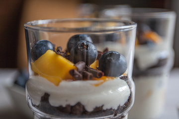 Closeup parfeit with mango and blueberry