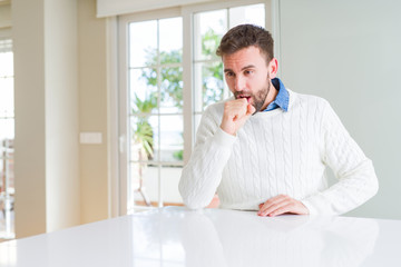 Fototapeta premium Handsome man wearing casual sweater feeling unwell and coughing as symptom for cold or bronchitis. Healthcare concept.