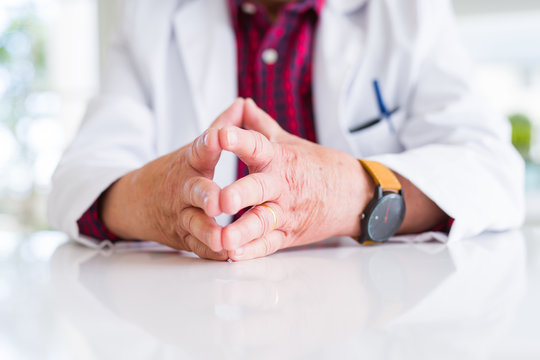 Close up of doctor man touching fingers