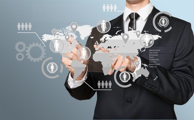 Businessman and  analytics symbol on  background