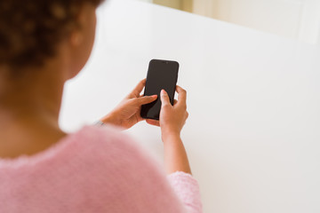 Close up of woman using blank screen of smartphone