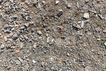 Ground stone grey background of many small stones