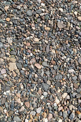 Ground stone grey background of many small stones