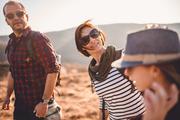 Happy family enjoying in the mountain hiking trip