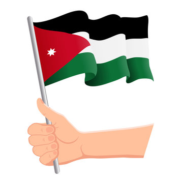 Hand holding and waving the national flag of Jordan. Fans, independence day, patriotic concept. Vector illustration, eps 10.