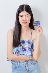 Woman holding Credit card summer holiday