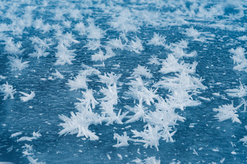 beautiful ice cristals on frozen lake
