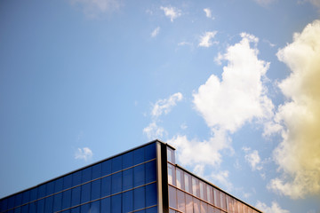 Fototapeta na wymiar Reflection of Sky and cloud on glass building