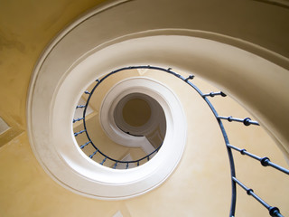 Spiral staircase inside a church. Element of a building.