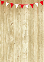 red and white pennants on wooden background