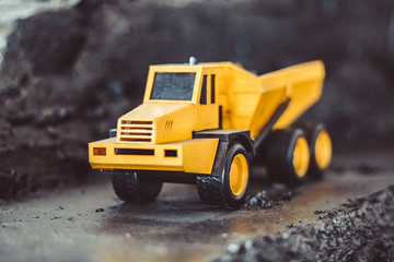 toy truck in the scenery of coal mining