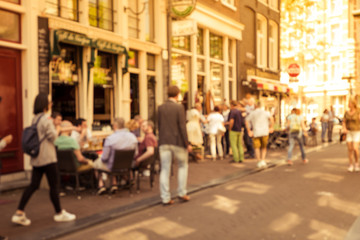 Blurred abstract background of outdoor cafe or restaurant in Amsterdam.